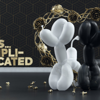 Two balloon dogs stand in rose arch